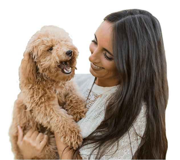 happy woman with poodle dog