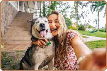 young woman excited with dog after getting esa letter approval